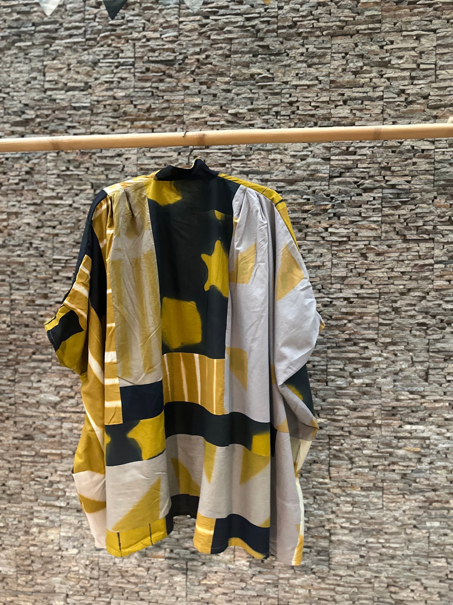 Patched mustard tunic