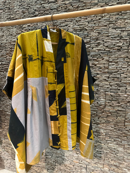 Patched mustard tunic